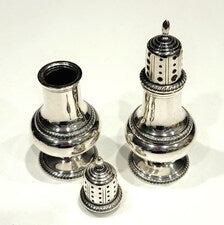 A pair of sterling silver salt and pepper shakers made by Gorham Manufacturing Co. No.SS141