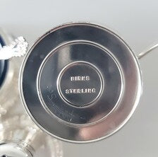 Birks, a famous Canadian brand, sterling silver salt and mustard bottle set with cobalt blue glass lining. No. SS081
