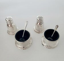 Birks, a famous Canadian brand, sterling silver salt and mustard bottle set with cobalt blue glass lining. No. SS081